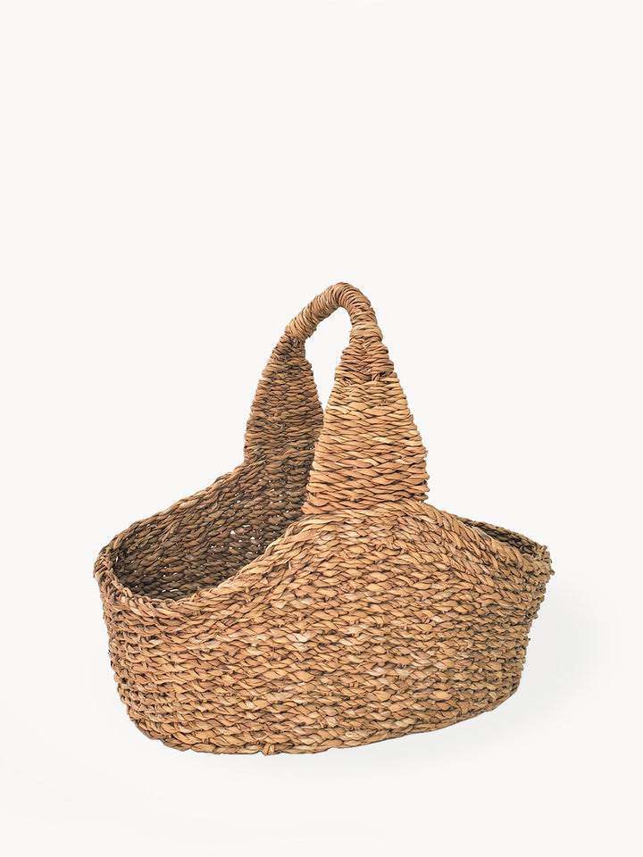 Natural seagrass picnic basket with clean lines and charm, ideal for home organization and decor.