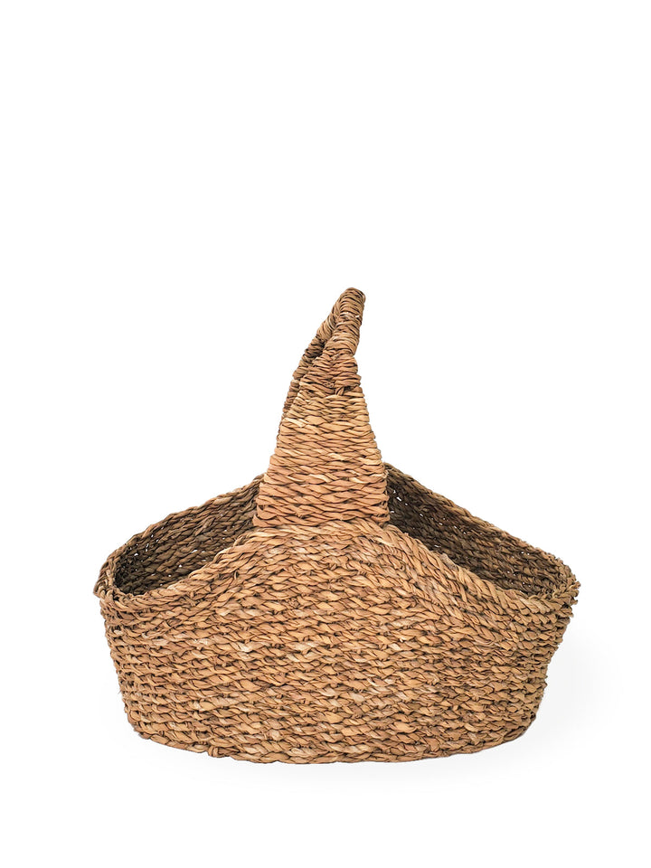 Natural seagrass picnic basket with clean lines, adding charm and warmth to any home space. Handmade, perfect for tidy organization.