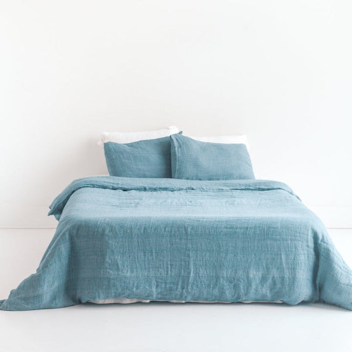 Denim Blue Linen Duvet Cover Set on Bed, Handwoven from Belgian Flax, Temperature-Regulating and Moisture-Wicking
