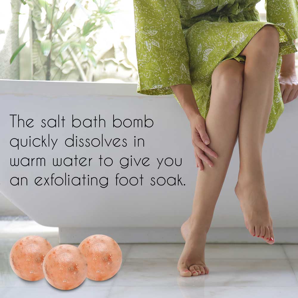 Himalayan Pink Salt Bath Ball next to a bath for soothing exfoliation and relaxation.