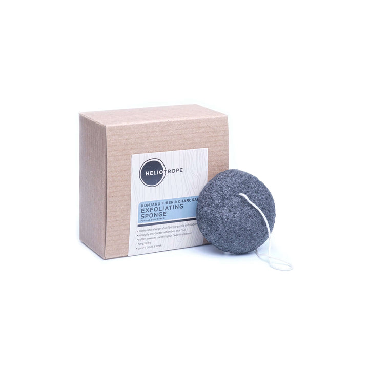 Konjaku and charcoal exfoliating sponge with packaging, natural skincare, gentle exfoliation and pH balancing features.