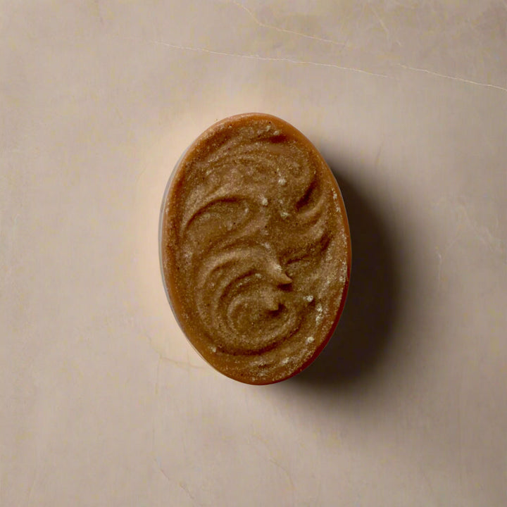 Afterglow Massage Bar Soap with dual-sided design for exfoliation and soothing, featuring ocean-inspired ingredients.