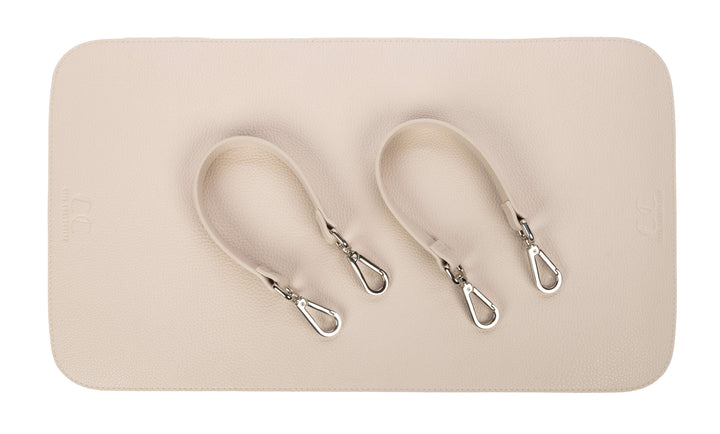 Citi Journey vegan leather diaper bag accessories in pearl finish with detachable straps on white background