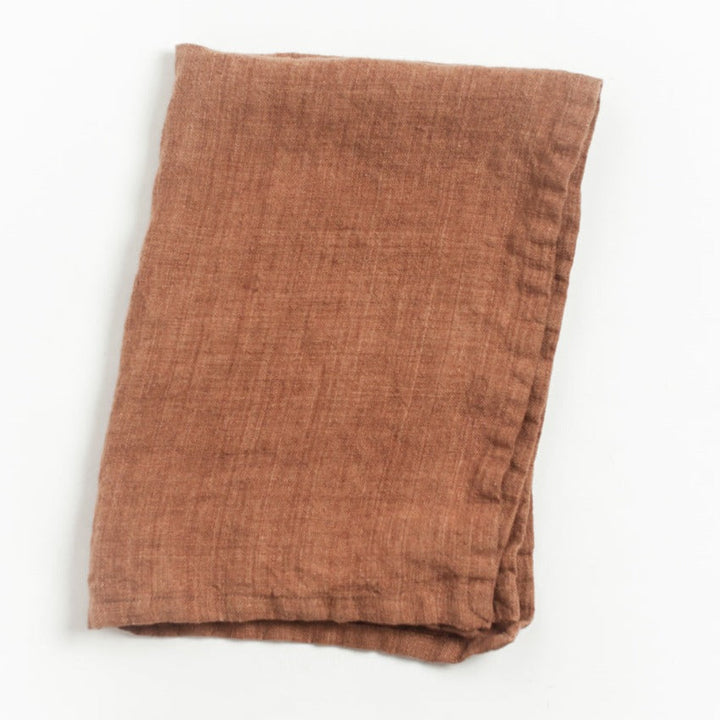 Rustic, terracotta linen cloth from the Hygge Gift Box. Perfect for cozy fall vibes and enjoying slow moments with earthy elegance.