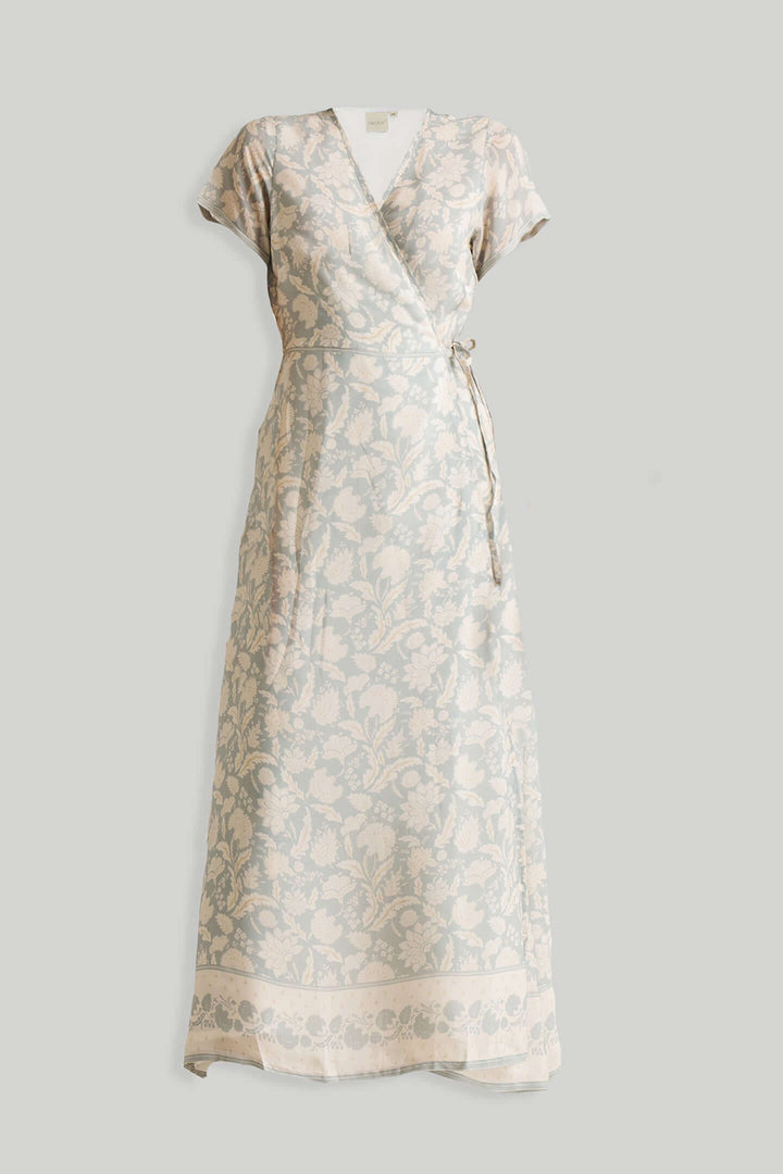Maxi wrap dress with blue floral patterns, elegant design in Bemberg™ crepe, perfect for casual to formal occasions.
