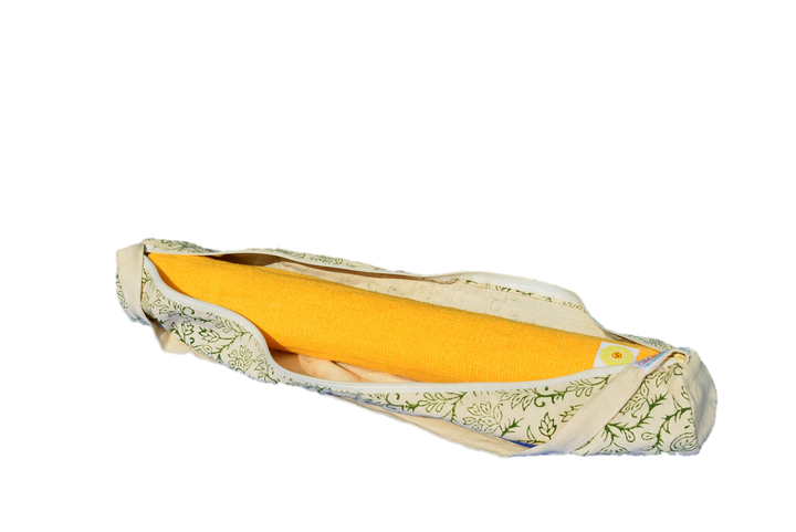 Yellow handwoven cotton yoga rug in decorative bag for floor meditation and Ashtanga practices. Eco-friendly and biodegradable.