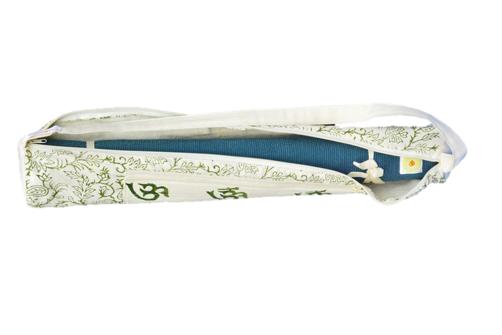 Yoga mat in white and green patterned bag with OM design, featuring zipper closure and shoulder strap for easy transport.