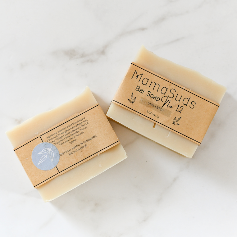 Unscented Bar Soap No. 12 with organic ingredients on a marble background.
