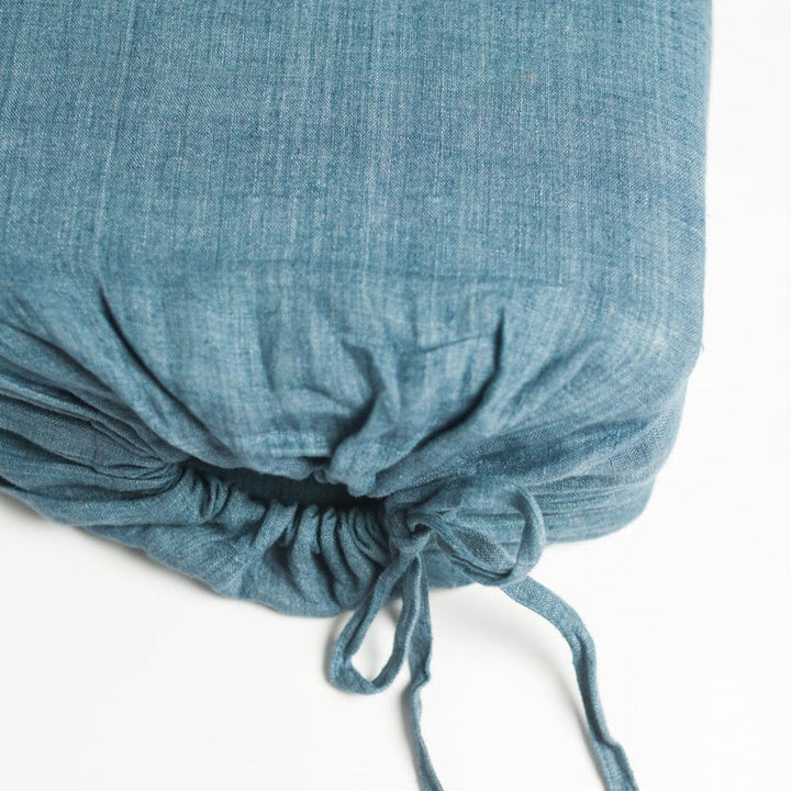 Denim Blue Linen Duvet Cover Set by Creative Women, made from fine Belgian flax, showcasing textured, woven fabric with drawstring closure.