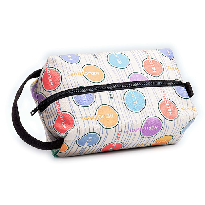 Colorful logo pattern Dopp kit with zipper and handle, made in San Francisco for travel essentials organization.