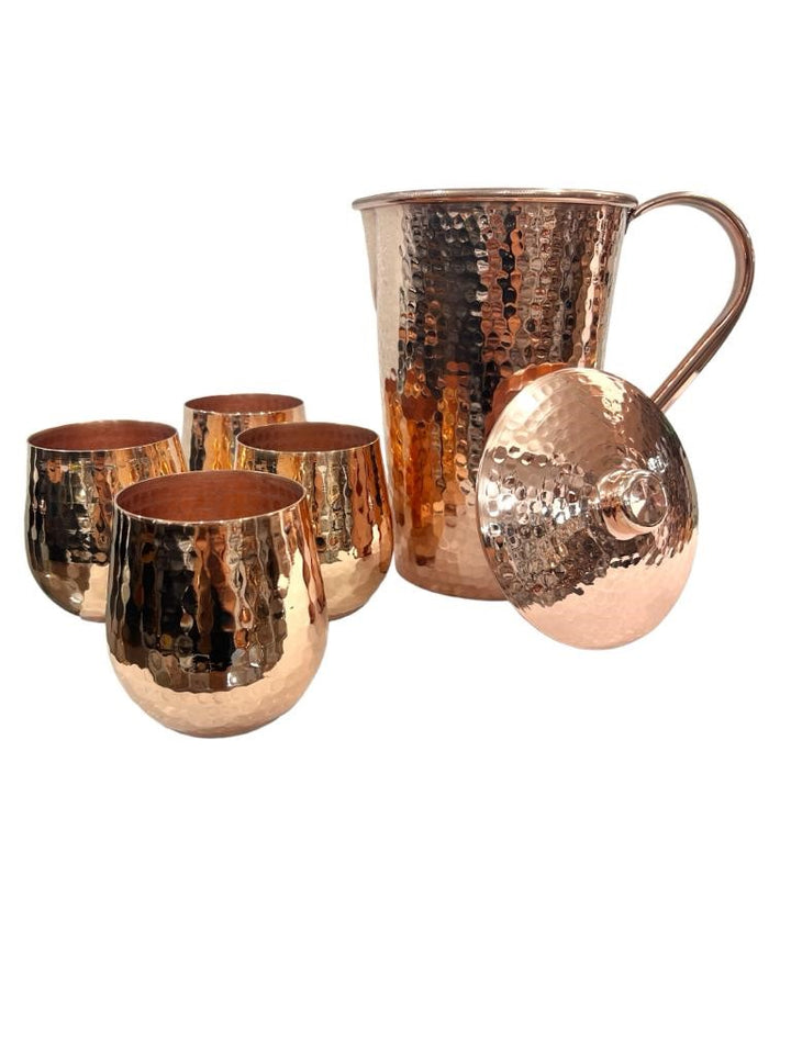 Hammered copper pitcher with lid and four matching tumblers, shiny finish, handcrafted drinkware set