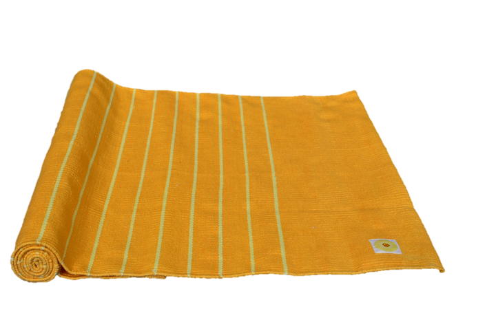 Handwoven cotton yoga meditation rug with OM design in yellow, eco-friendly and biodegradable with finished edges and fringes