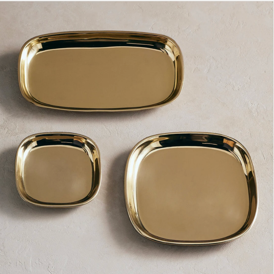 Three gold decorative trays from the Handmade Home Decor collection, perfect for adding elegance to any living space.