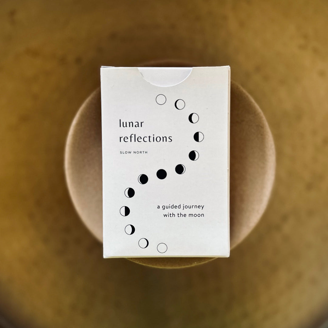 Box of Lunar Reflections Mindfulness Cards featuring moon phase design on a gold background. Perfect for enhancing mindfulness and self-awareness.