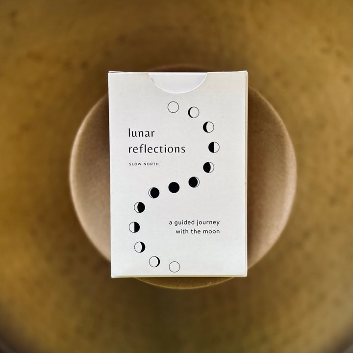 Box of Lunar Reflections Mindfulness Cards featuring moon phase design on a gold background. Perfect for enhancing mindfulness and self-awareness.