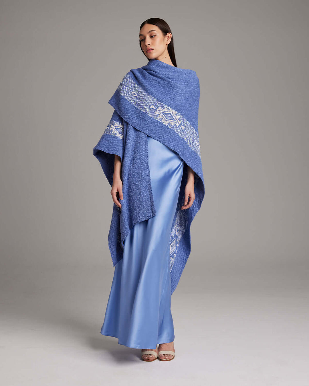 Model wearing Estrella Cotton Duster in Periwinkle/Ivory, handmade in Chile, featuring divine femininity symbol, crafted by Mapuche artisans.
