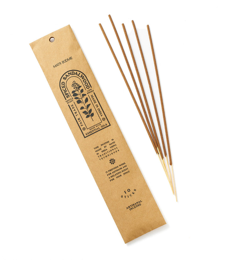 Sandalwood incense sticks from the Fall Vibes Hygge Gift Box, offering soothing aroma for cozy rituals and earthy elegance.