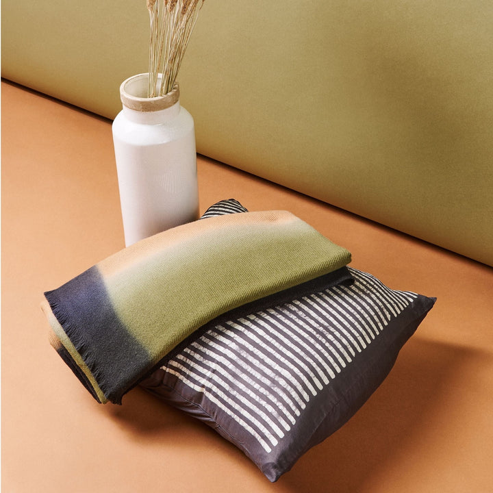 Black striped mulberry silk pillow cover with hand block printed pattern on natural linen bedding