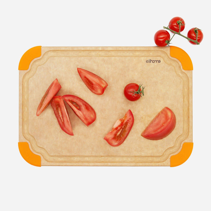 Small premium cutting board with color-coded non-slip feet and food safety icons for kitchen organization