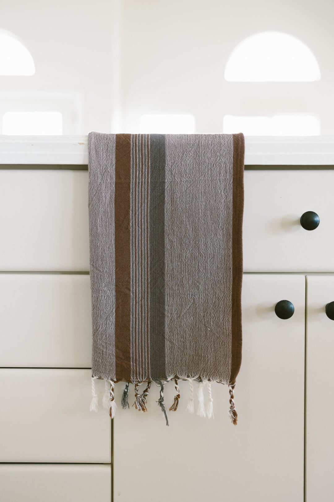 Brown grey handwoven Turkish cotton hand towel with natural texture and traditional artisan craftsmanship