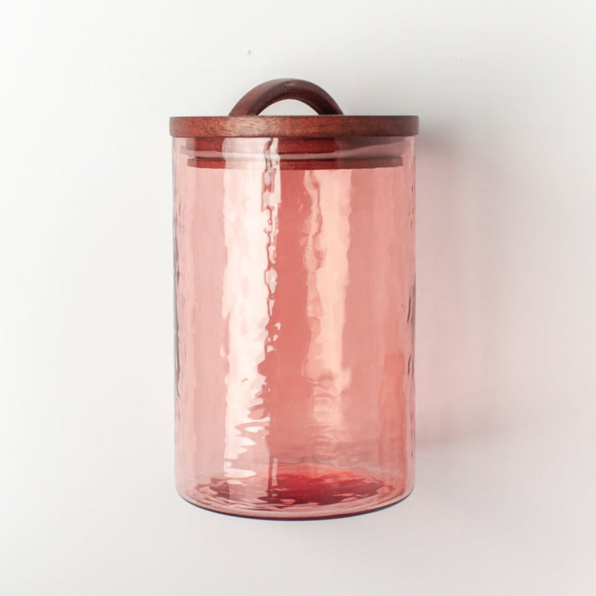Blush glass canister with hand-carved wooden lid, 5x7, airtight seal, perfect for kitchen storage, made in India.