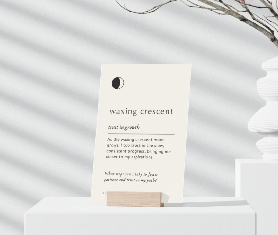 Lunar Reflections Mindfulness Card for waxing crescent, featuring growth message on a display stand, enhancing mindfulness practices.
