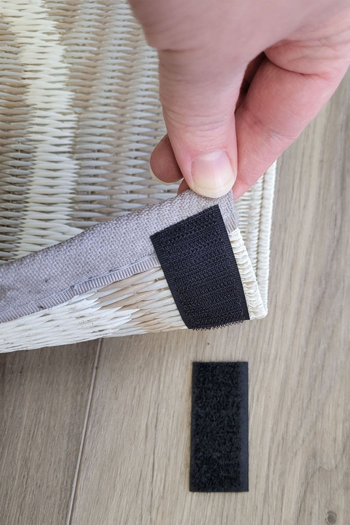 Hook and loop corner mat stays arranged to show attachment system for keeping rugs flat