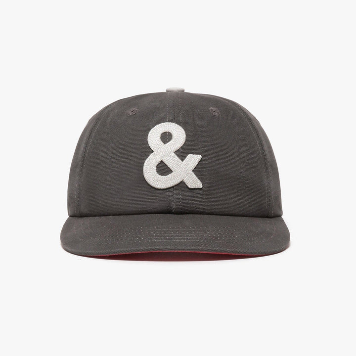 Charcoal gray baseball cap with leather strap adjustment and chain-stitched detailing on cotton canvas