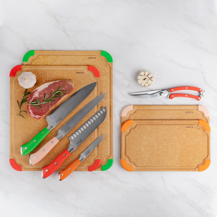 9-piece cutting board and knife set with color-coded boards and German steel knives arranged on kitchen counter
