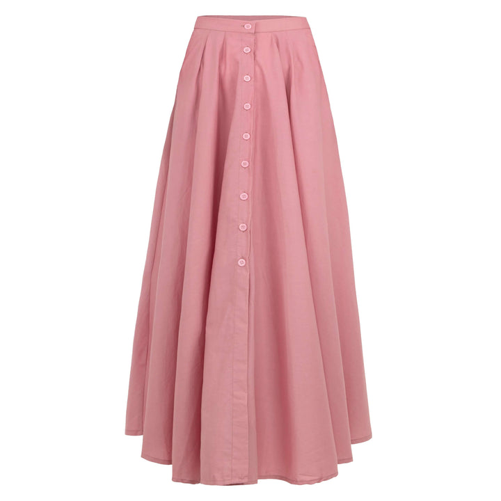 Blush pink Arum Pleated Maxi Skirt with smocked waist, buttons, and pockets, designed in Bali for a soft and feminine look.