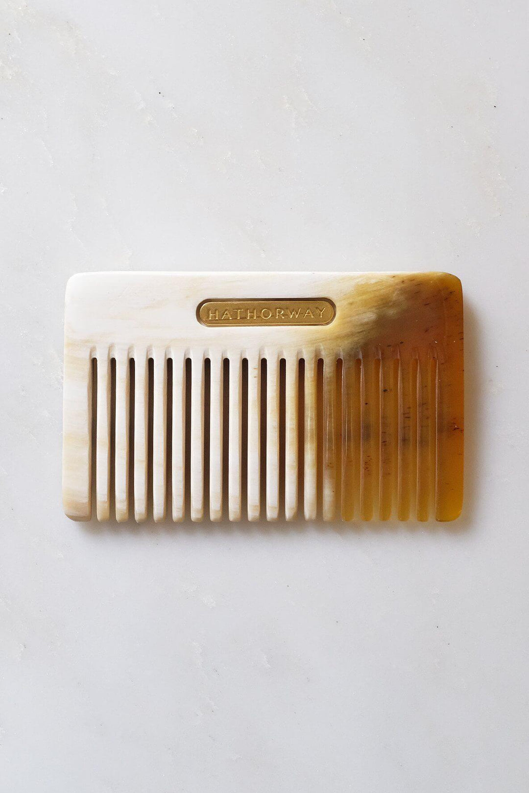 Pocket-sized Chai Buffalo Horn Comb by Hathorway, ethically sourced and perfect for hair and beard grooming.