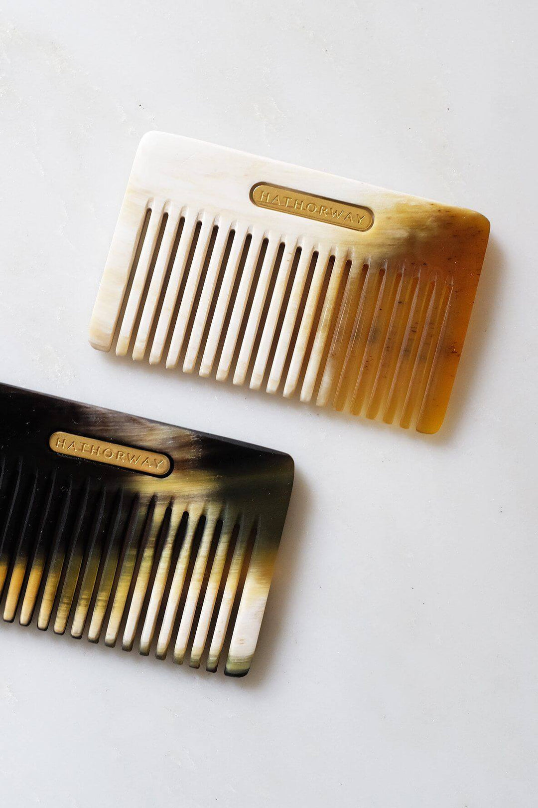 Pocket-sized Chai Buffalo Horn Comb for hair and beard by Hathorway, featuring a natural ethical design and compact size.