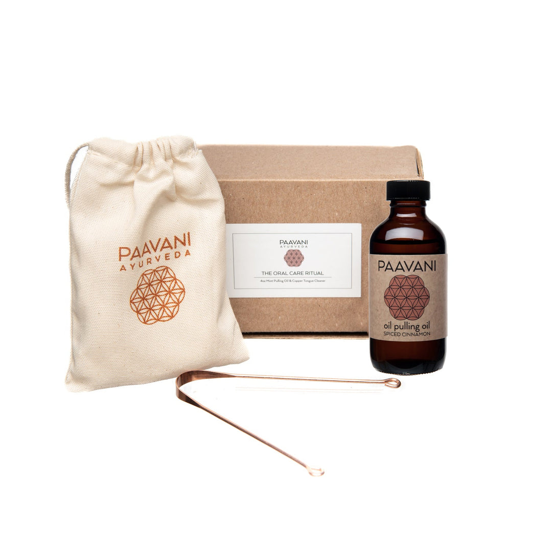 Ayurvedic Oral Care Ritual set including oil pulling bottle, tongue cleaner, and storage pouch for holistic dental hygiene.
