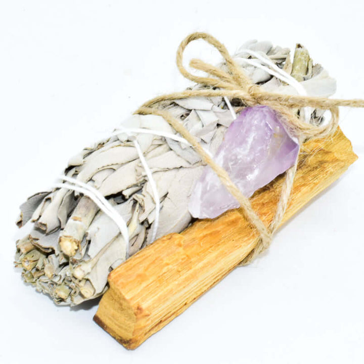 Alt Tag: Palo Santo, crystal, and sage smudge bundle for spiritual cleansing and energy clearing, featuring a choice of crystal.