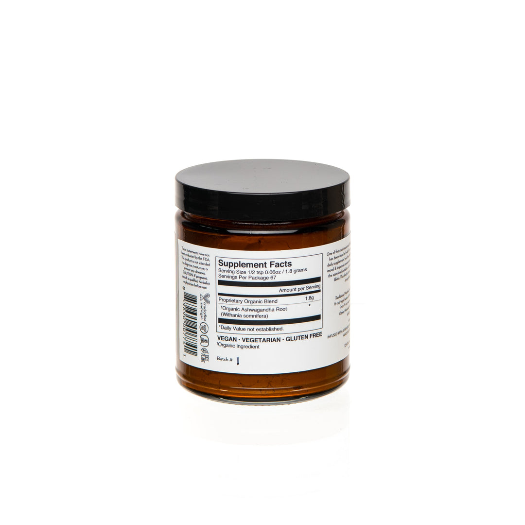 Ashwagandha Powder supplement facts and ingredients label on jar, vegan and gluten-free adaptogenic supplement.