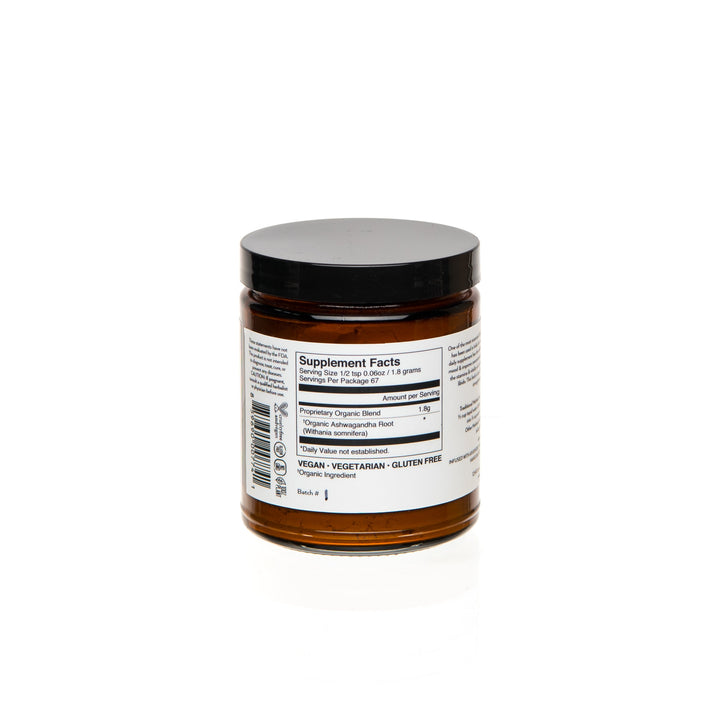 Ashwagandha Powder supplement facts and ingredients label on jar, vegan and gluten-free adaptogenic supplement.