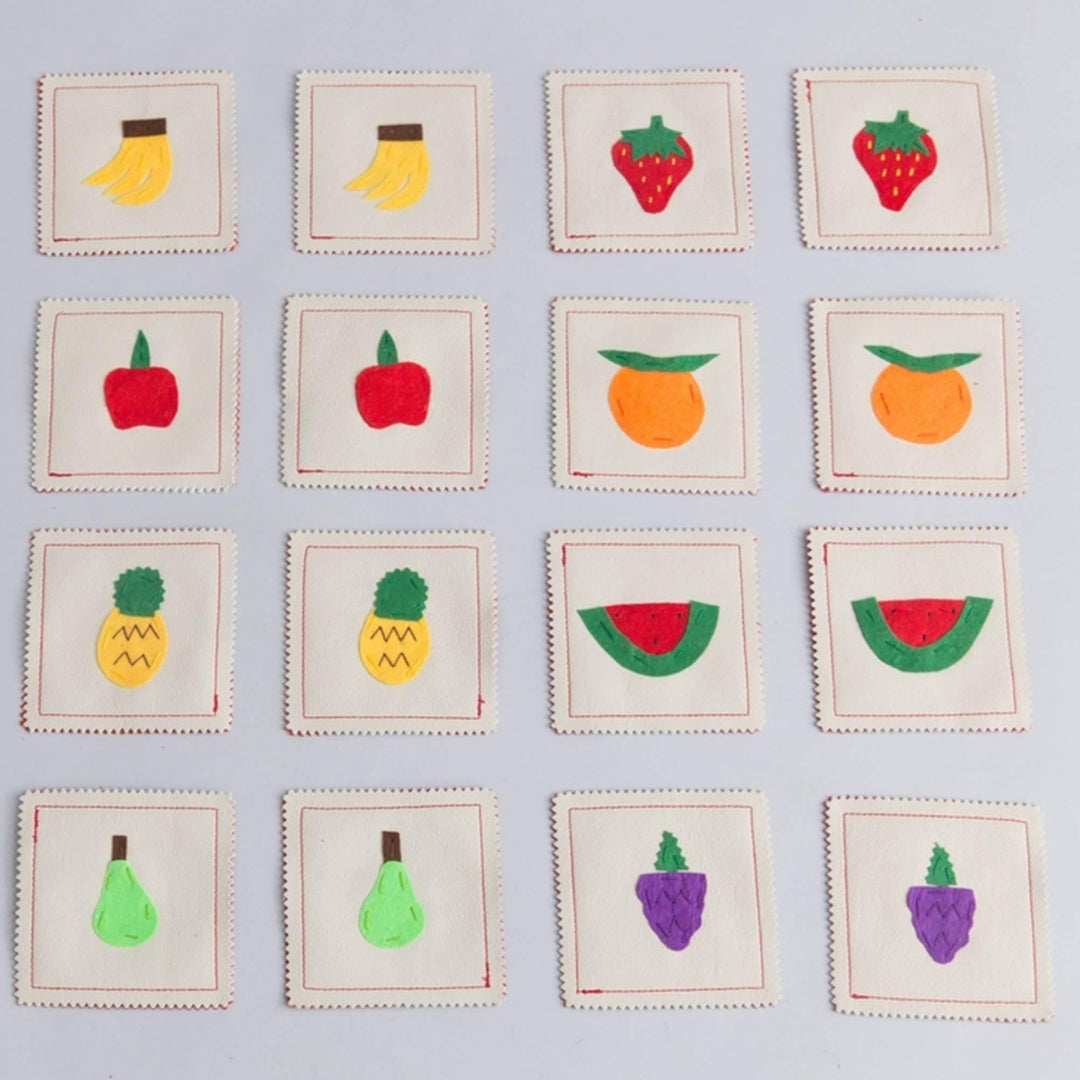 Handmade fabric fruits memory game with 16 colorful matching pieces and carrying case