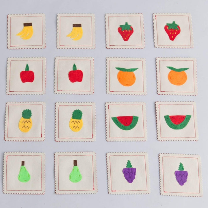 Handmade fabric fruits memory game with 16 colorful matching pieces and carrying case