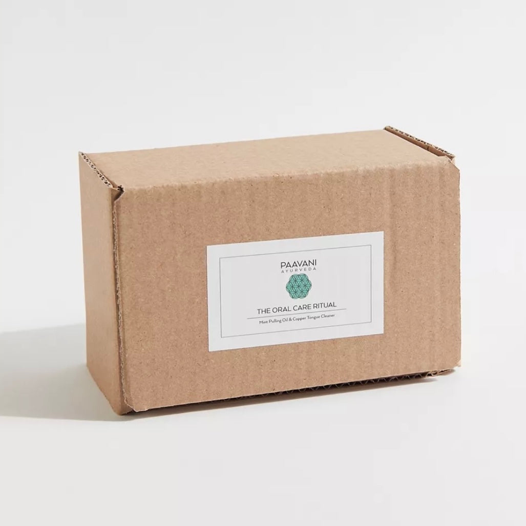 Ayurvedic Oral Care Ritual box for oil pulling and tongue cleaning, promoting digestive wellness and vitality.