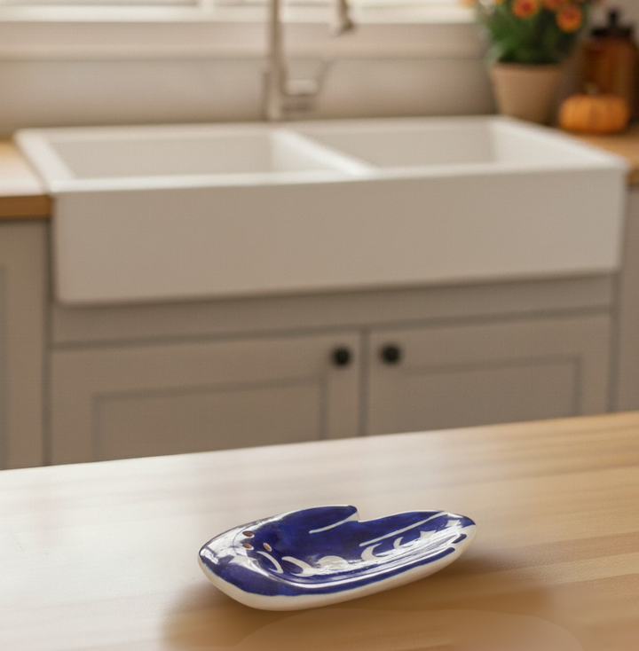 Blue decorative incense holder in a cozy kitchen setting, part of the Fall Vibes, Hygge Gift Box curated by The Ever Good.