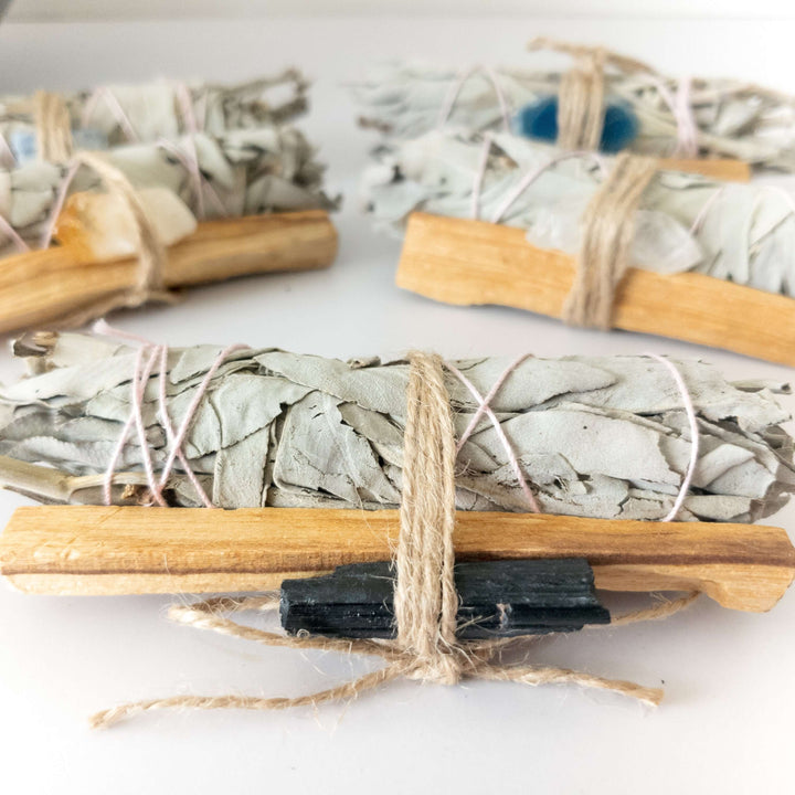 Palo Santo, Crystal, and Sage Smudge Bundle for spiritual cleansing and positivity