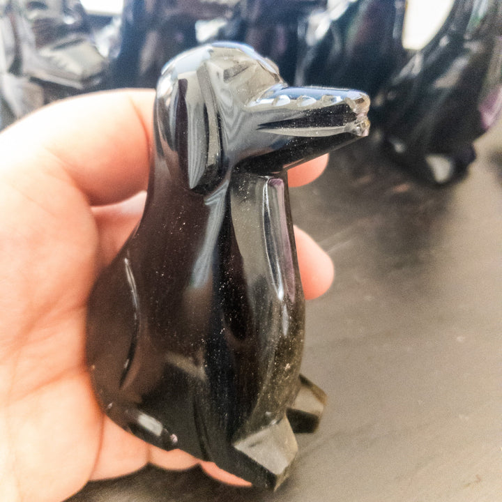 Handcrafted gold sheen obsidian dog figurine with natural golden flash, 4 inches tall, made in Mexico