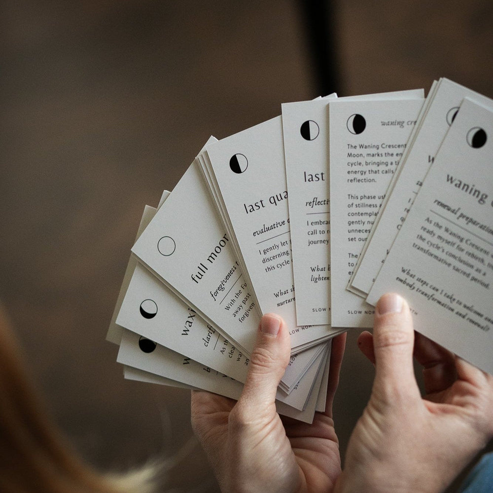 Person holding moon phase affirmation cards, part of the Calming Rituals Collection gift bundle for relaxation and connection.