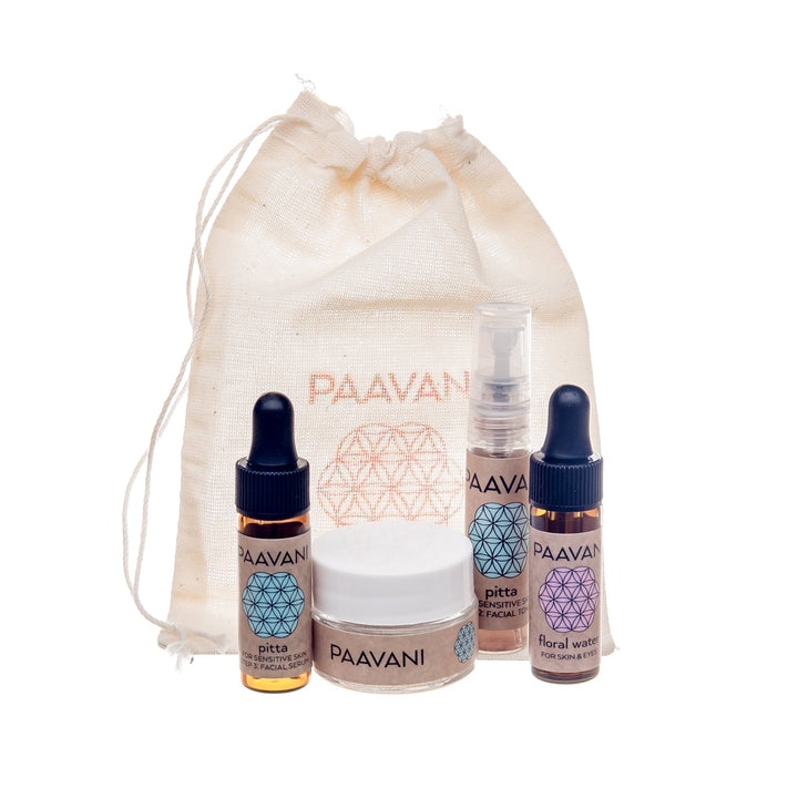 Pitta Skincare Ritual kit with oils, cream, and travel pouch for red, sensitive skin relief and ayurvedic face care.