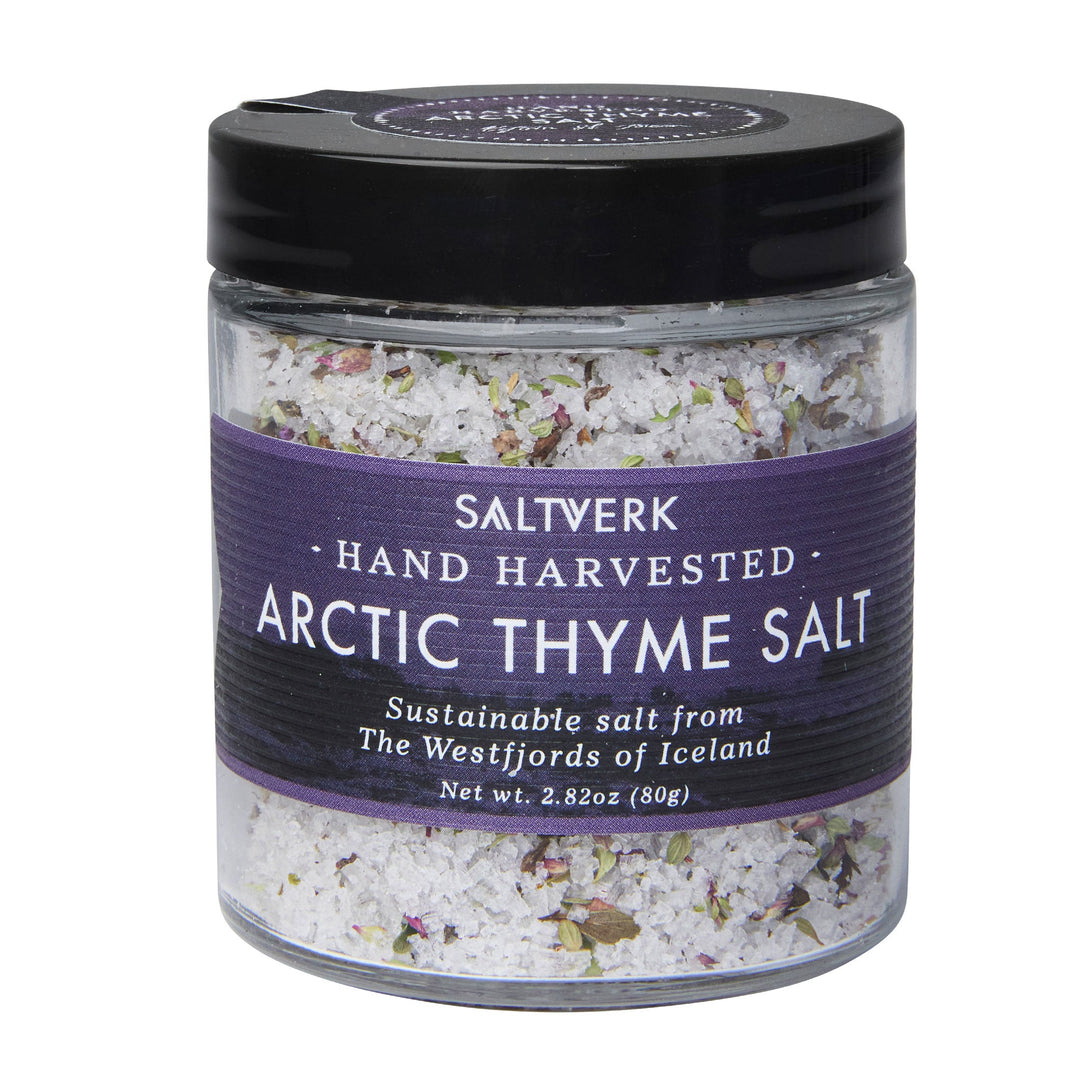 Jar of Saltverk Arctic Thyme Salt, sustainably hand-harvested from Iceland's Westfjords, featuring a purple label and white salt blend.