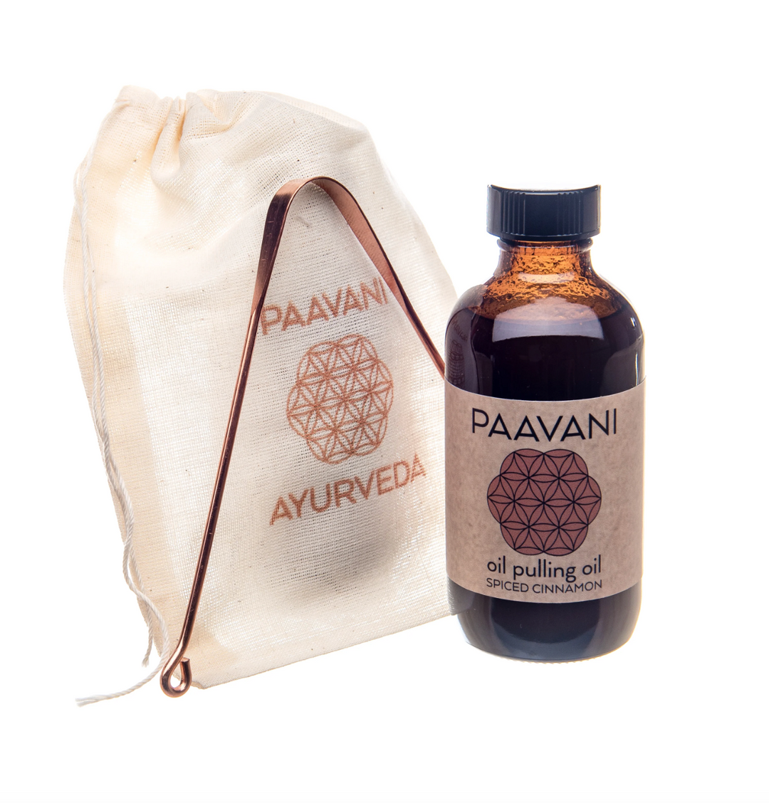 Ayurvedic Oral Care Ritual set with Paavani oil pulling oil and tongue cleaner for enhanced digestive wellness.