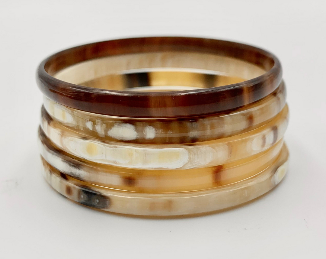 Style Kit: Sustainable brown horn bracelets from the Natural Style discovery bundle, showcasing curated eco-friendly fashion accessories.