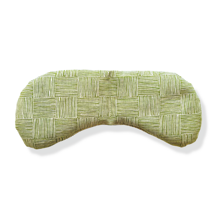 Weighted eye mask with a soothing green textural pattern for migraine relief and stress reduction.