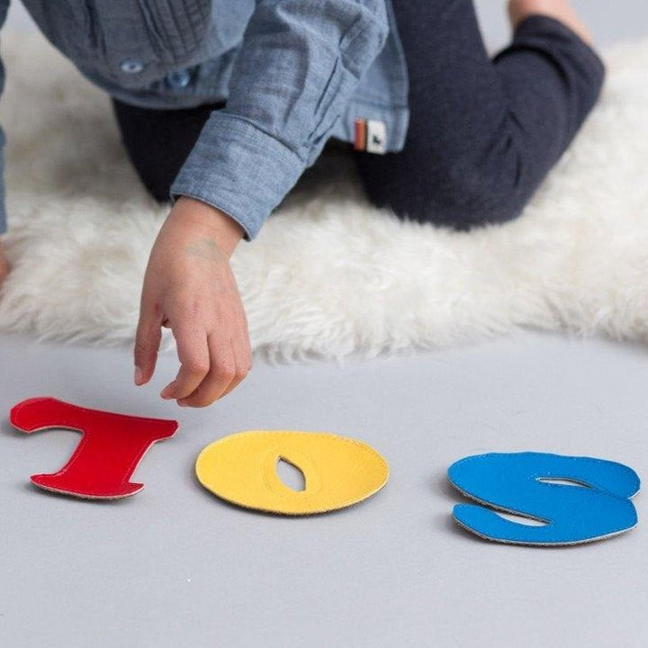 Handcrafted Spanish alphabet letters in colorful felt with storage bag for bilingual language learning