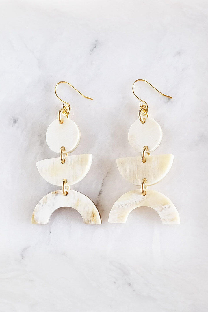 Handcrafted light horn geometric buffalo horn earrings with gold-plated hooks, natural design, assembled in California.